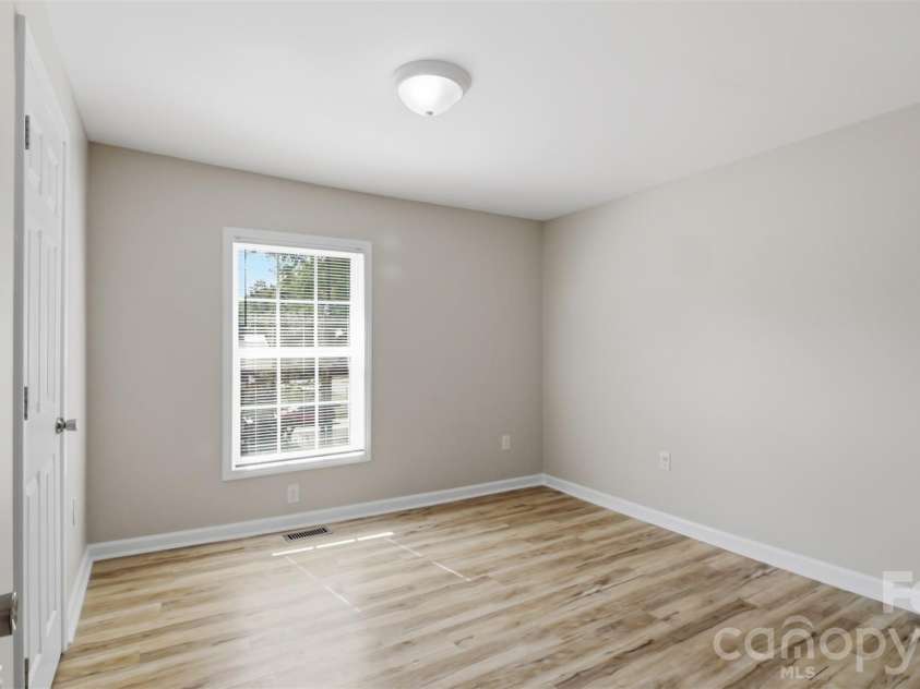 413 Pleasant Avenue, Kannapolis, NC 28081.  MLS# CAR4432895, YatesRealty ID 55647. Primary Bedroom