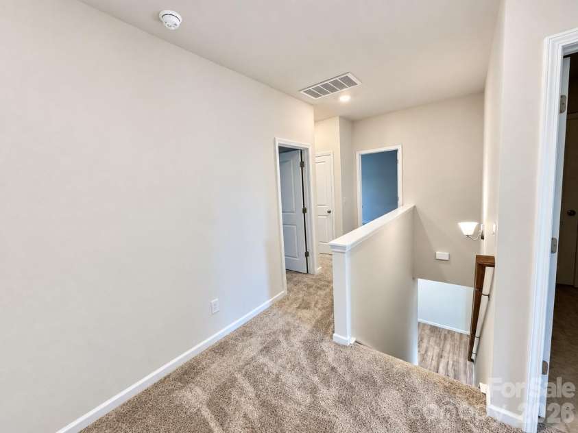 8149 Merryvale Lane, Charlotte, NC 28214.  MLS# CAR4432571, YatesRealty ID 55655. Flexible loft area.