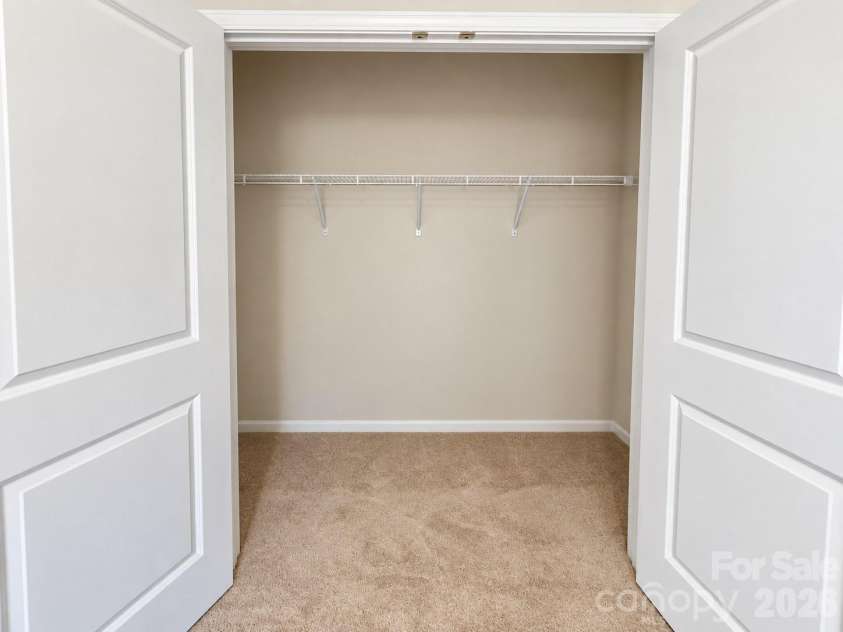8149 Merryvale Lane, Charlotte, NC 28214.  MLS# CAR4432571, YatesRealty ID 55655. Spacious bedroom closet. Convenient storage to keep everything organized.
