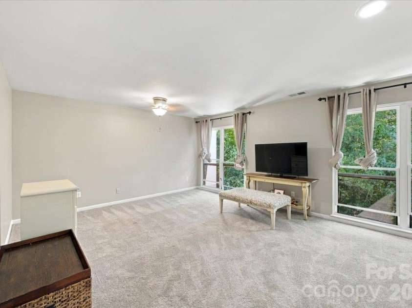 5805 Sharon Road, Charlotte, NC 28210.  MLS# CAR4432363, YatesRealty ID 55662. Primary bedroom 3rd level with ensuite bath