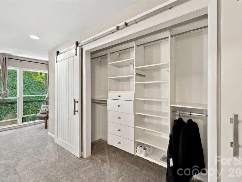 5805 Sharon Road, Charlotte, NC 28210.  MLS# CAR4432363, YatesRealty ID 55662. Primary ensuite bedroom with multiple closets