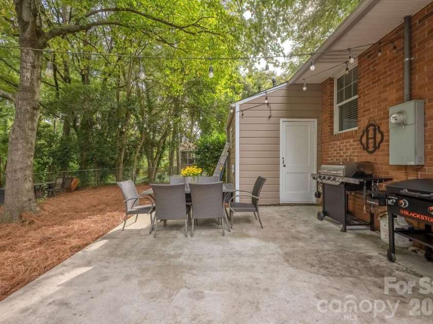 4805 Murrayhill Road, Charlotte, NC 28209.  MLS# CAR4431947, YatesRealty ID 55669. Back patio