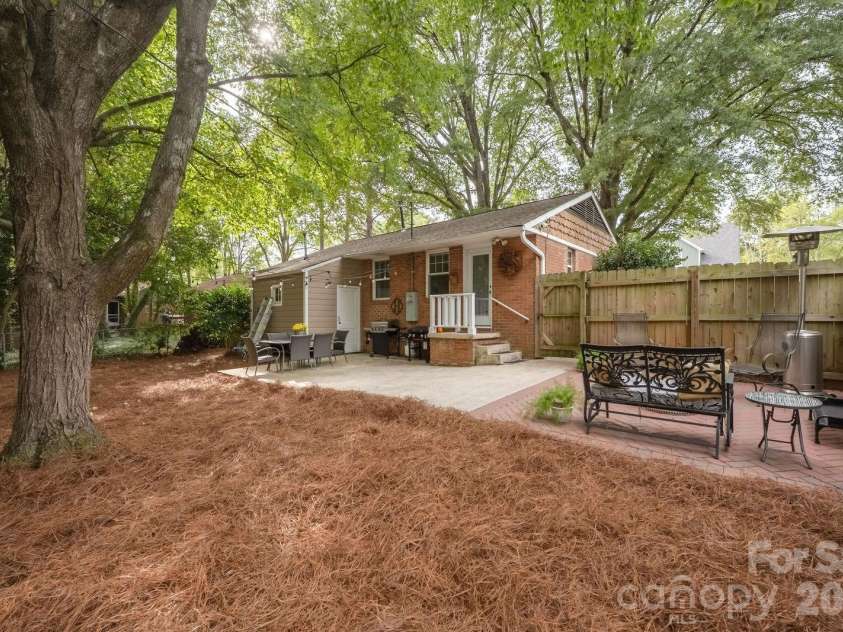 4805 Murrayhill Road, Charlotte, NC 28209.  MLS# CAR4431947, YatesRealty ID 55669. Backyard looking back to the house