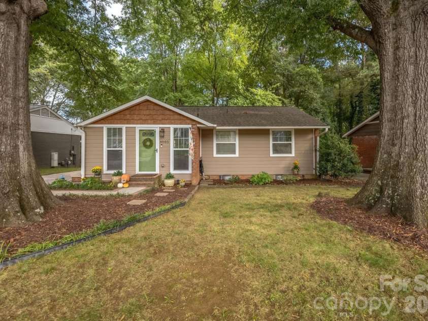 4805 Murrayhill Road, Charlotte, NC 28209.  MLS# CAR4431947, YatesRealty ID 55669. Front yard with mature hardwoods
