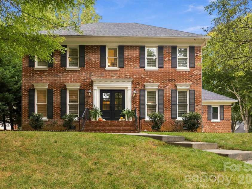 9414 Tillot Drive, Matthews, NC 28105.  MLS# CAR4431746, YatesRealty ID 55675. Front of Home