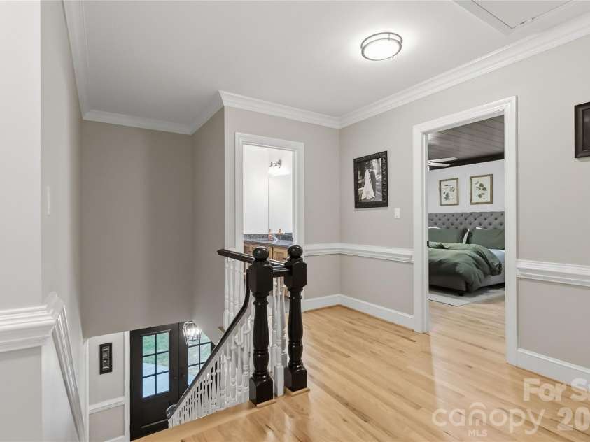 9414 Tillot Drive, Matthews, NC 28105.  MLS# CAR4431746, YatesRealty ID 55675. Upper hall, new hardwood floors