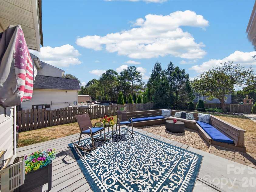 5725 Lindley Crescent Drive, Indian Trail, NC 28079.  MLS# CAR4431412, YatesRealty ID 55691. Backyard entertainment/seating area
