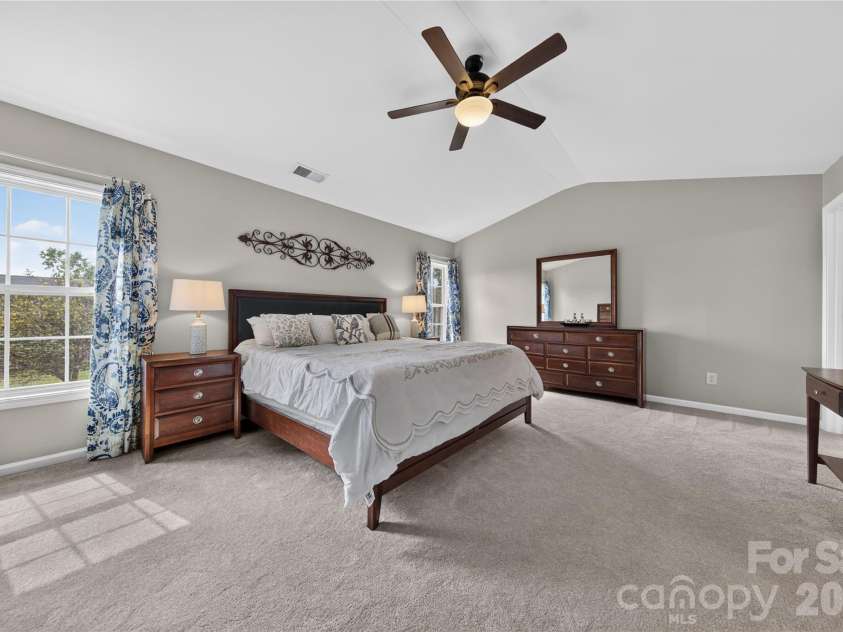 5725 Lindley Crescent Drive, Indian Trail, NC 28079.  MLS# CAR4431412, YatesRealty ID 55691. Expansive, primary bedroom with vaulted ceiling and ensuite bathroom
