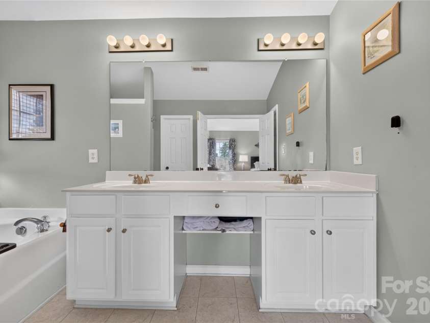 5725 Lindley Crescent Drive, Indian Trail, NC 28079.  MLS# CAR4431412, YatesRealty ID 55691. Primary bathroom with dual vanities