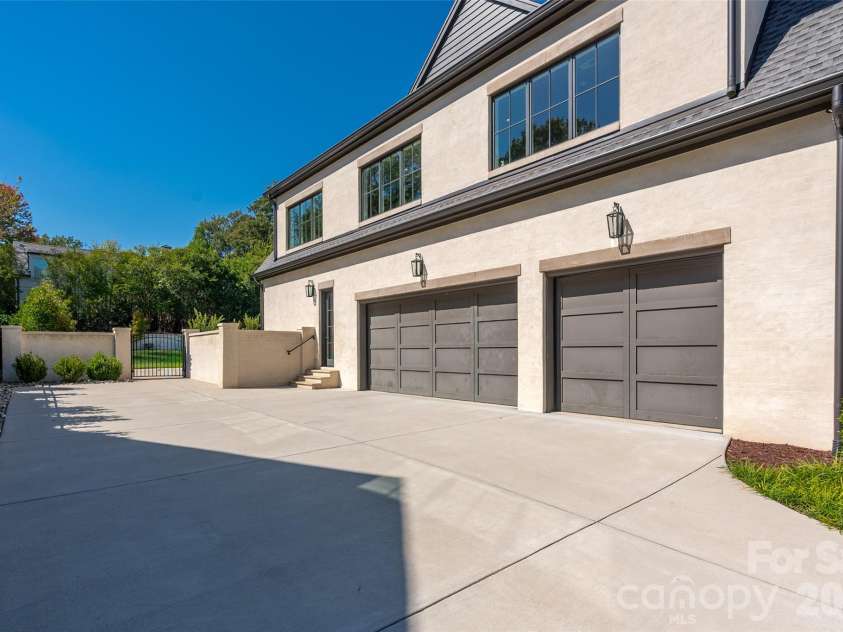 2111 Cortelyou Road, Charlotte, NC 28211.  MLS# CAR4431155, YatesRealty ID 55699. Three-car garage