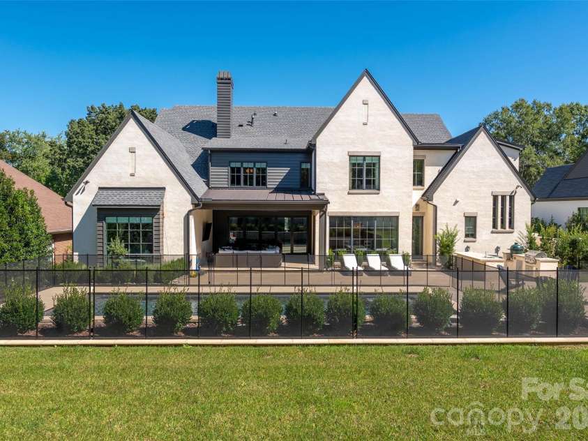 2111 Cortelyou Road, Charlotte, NC 28211.  MLS# CAR4431155, YatesRealty ID 55699. View of home from backyard 2