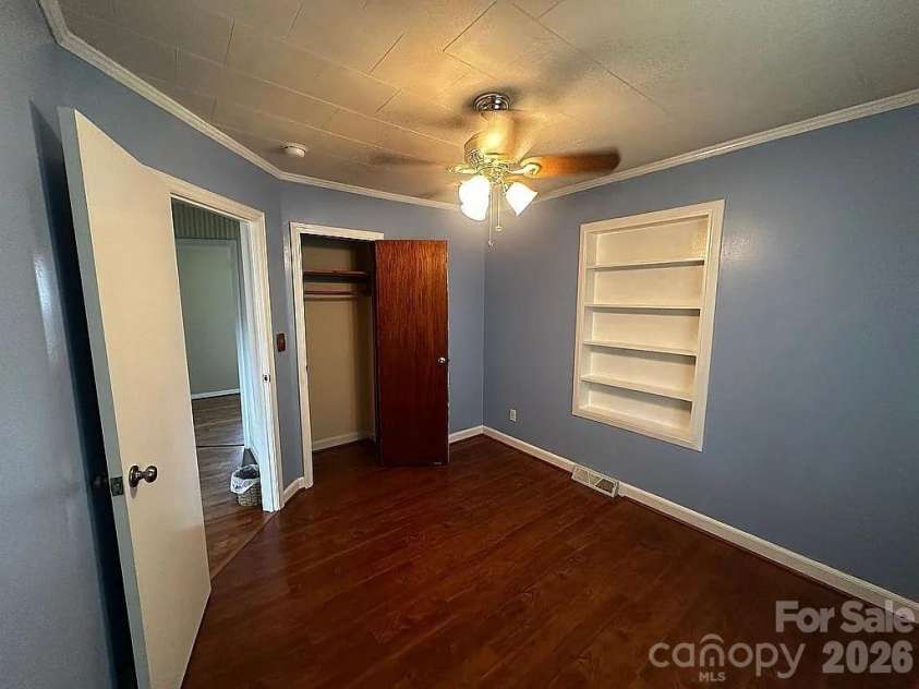 34 Sunset Drive, Brevard, NC 28712.  MLS# CAR4358442, YatesRealty ID 5570. Bedroom 2/Built Ins