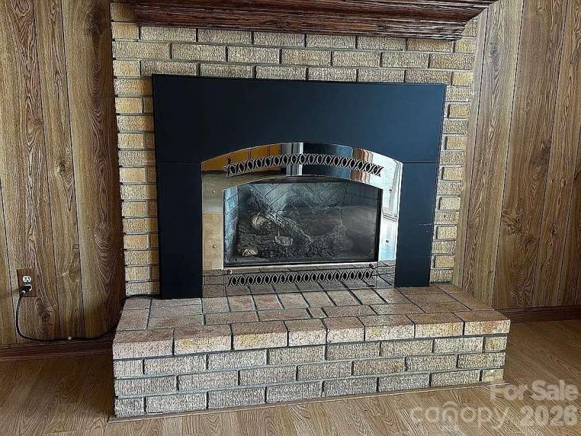 34 Sunset Drive, Brevard, NC 28712.  MLS# CAR4358442, YatesRealty ID 5570. Fireplace with Gas Logs