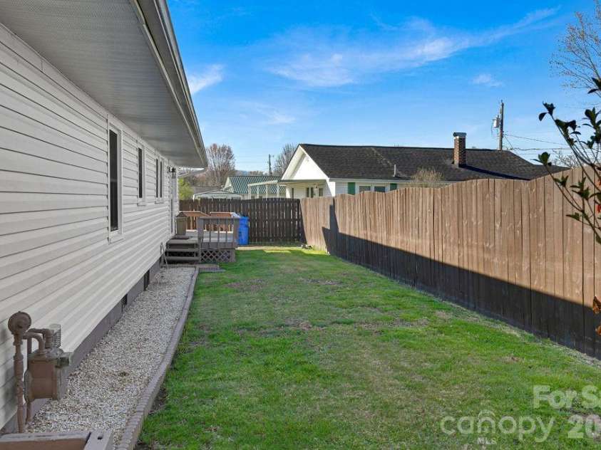 34 Sunset Drive, Brevard, NC 28712.  MLS# CAR4358442, YatesRealty ID 5570. Private Back Yard