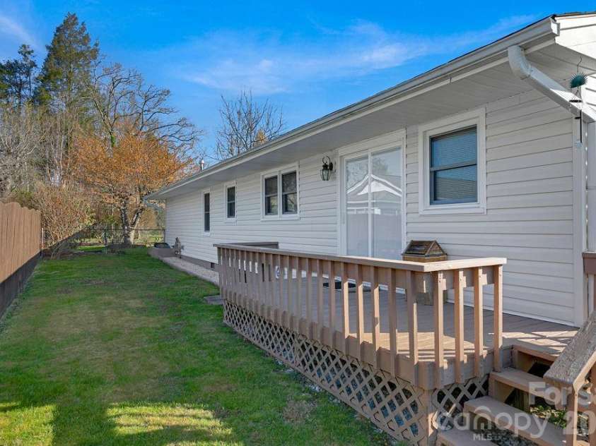 34 Sunset Drive, Brevard, NC 28712.  MLS# CAR4358442, YatesRealty ID 5570. Rear Grilling Deck