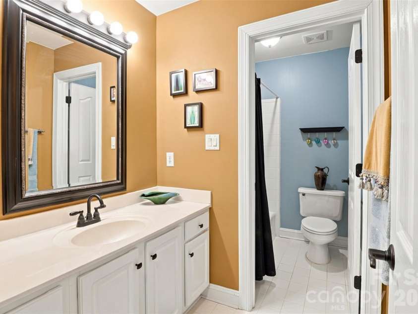 3564 Weddington Oaks Drive, Matthews, NC 28104.  MLS# CAR4430938, YatesRealty ID 55702. Hallway bathroom