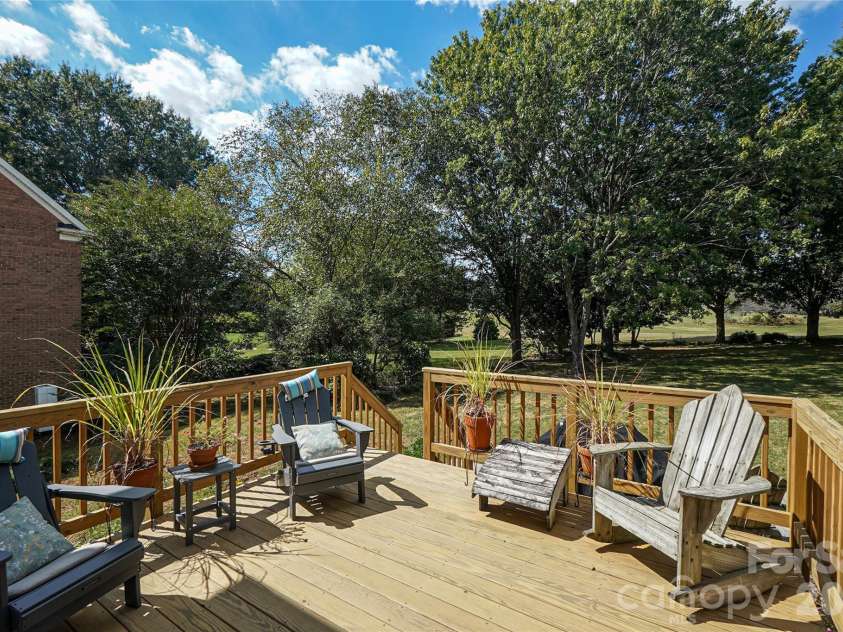 8120 Glamorgan Lane, Matthews, NC 28104.  MLS# CAR4430741, YatesRealty ID 55705. Deck View of Private Yard