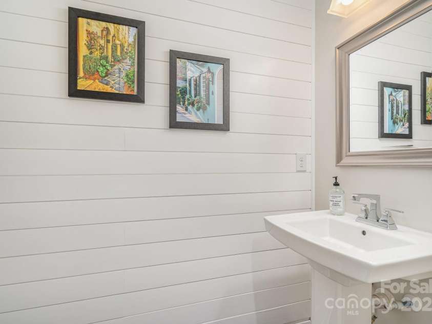 125 Lanyard Drive, Mooresville, NC 28117.  MLS# CAR4234396, YatesRealty ID 5571. Powder Room has shiplap accent wall.