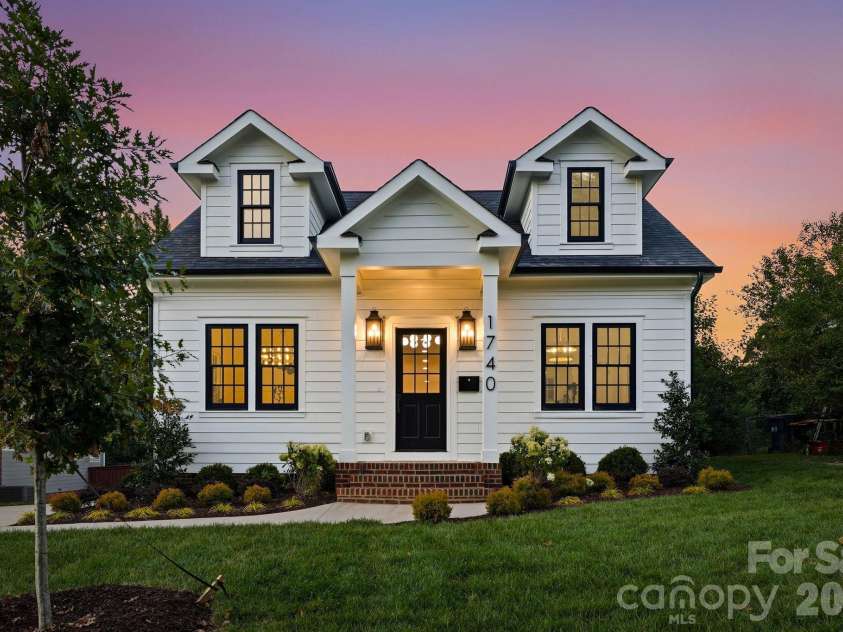 1740 Merriman Avenue, Charlotte, NC 28203.  MLS# CAR4430003, YatesRealty ID 55716. Front exterior at twilight