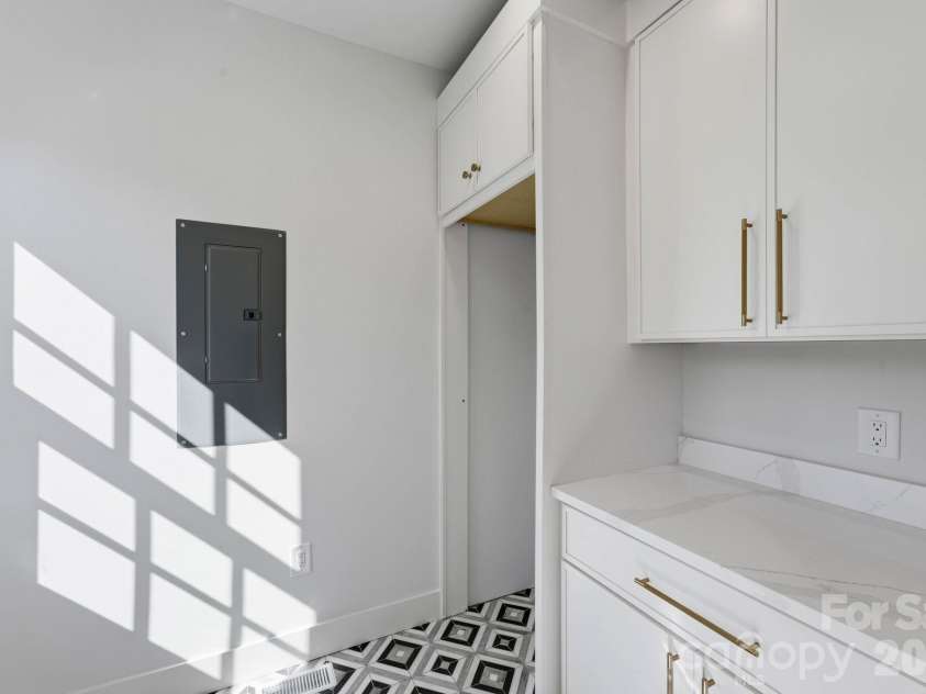 1740 Merriman Avenue, Charlotte, NC 28203.  MLS# CAR4430003, YatesRealty ID 55716. Laundry room (main level)