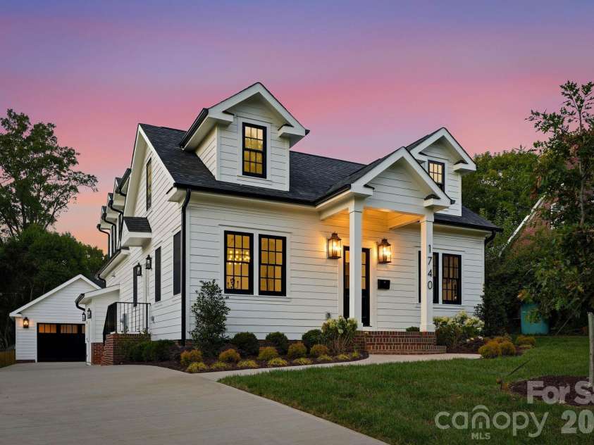 1740 Merriman Avenue, Charlotte, NC 28203.  MLS# CAR4430003, YatesRealty ID 55716. Side exterior at twilight