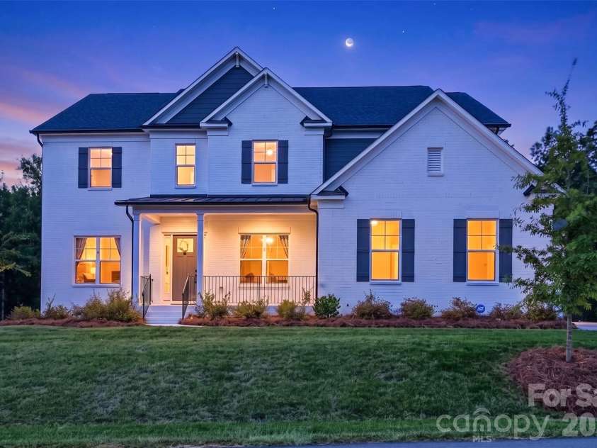 1216 Glade Arch Lane, Huntersville, NC 28078.  MLS# CAR4429661, YatesRealty ID 55720. First Impressions that last. Full brick transitional design on a private cul-de-sac