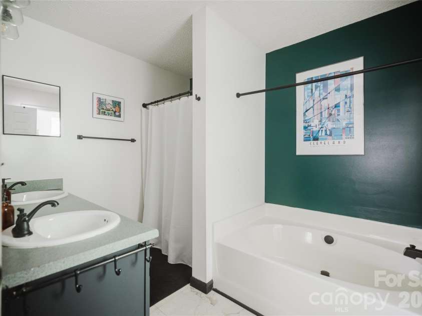 91 Crestview Street, Canton, NC 28716.  MLS# CAR4429307, YatesRealty ID 55727. Primary bathroom