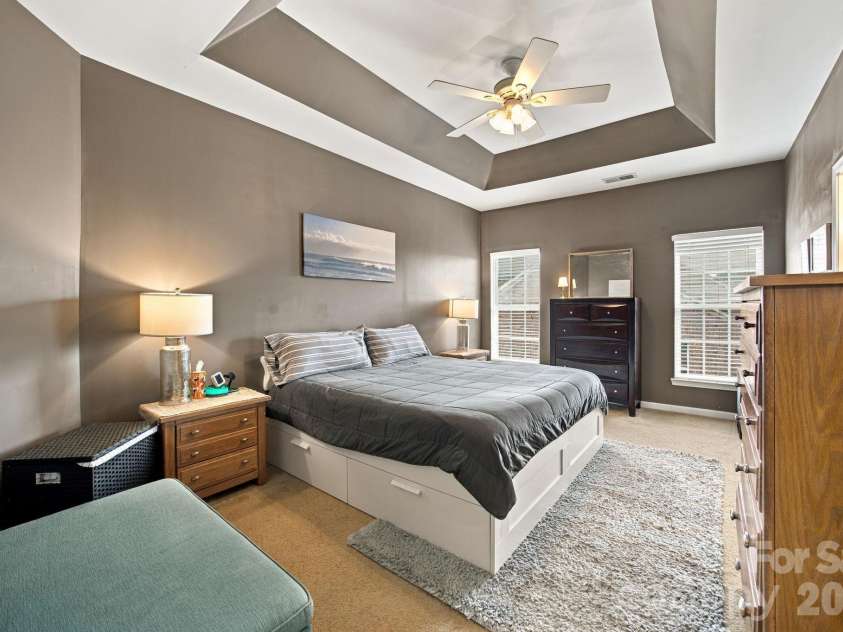 409 Armour Street, Davidson, NC 28036.  MLS# CAR4426934, YatesRealty ID 55738. Primary bedroom