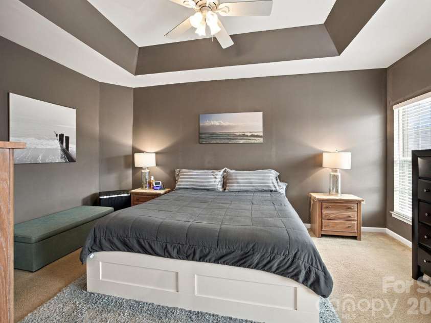 409 Armour Street, Davidson, NC 28036.  MLS# CAR4426934, YatesRealty ID 55738. Primary bedroom