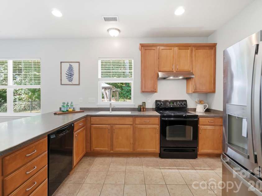 10329 Misty Moss Court, Mint Hill, NC 28227.  MLS# CAR4431248, YatesRealty ID 55756. A view of the backyard