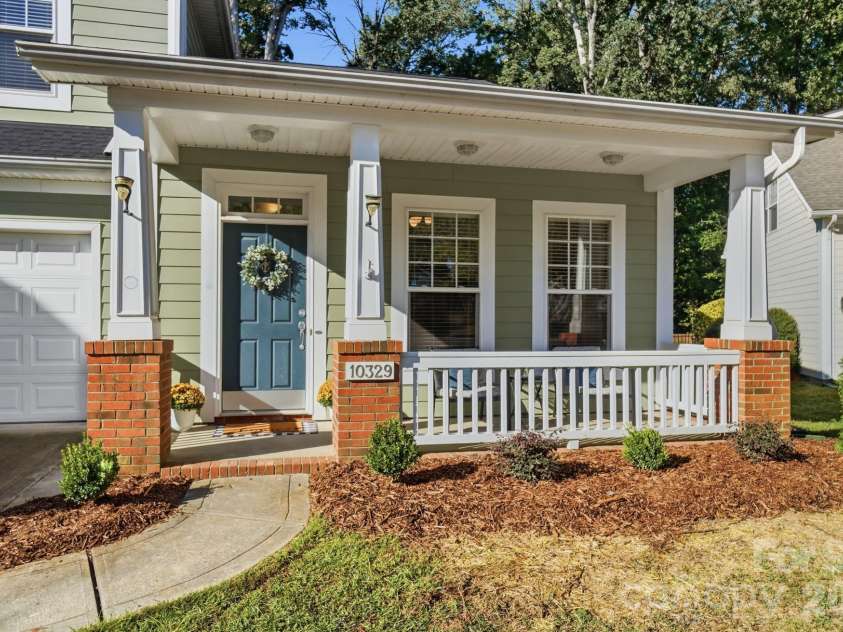 10329 Misty Moss Court, Mint Hill, NC 28227.  MLS# CAR4431248, YatesRealty ID 55756. Covered front porch