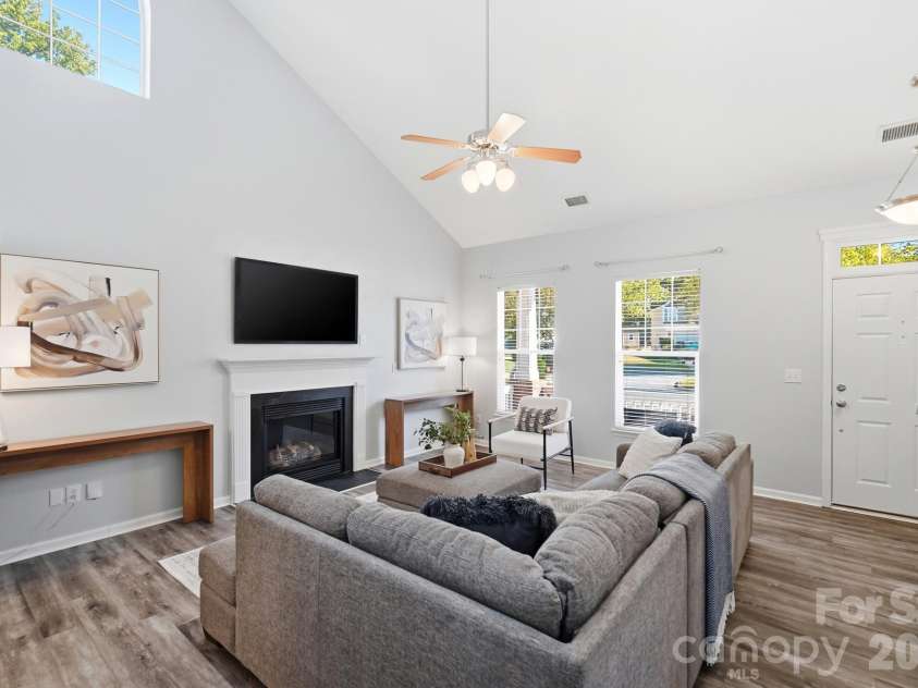 10329 Misty Moss Court, Mint Hill, NC 28227.  MLS# CAR4431248, YatesRealty ID 55756. Great Room with fireplace