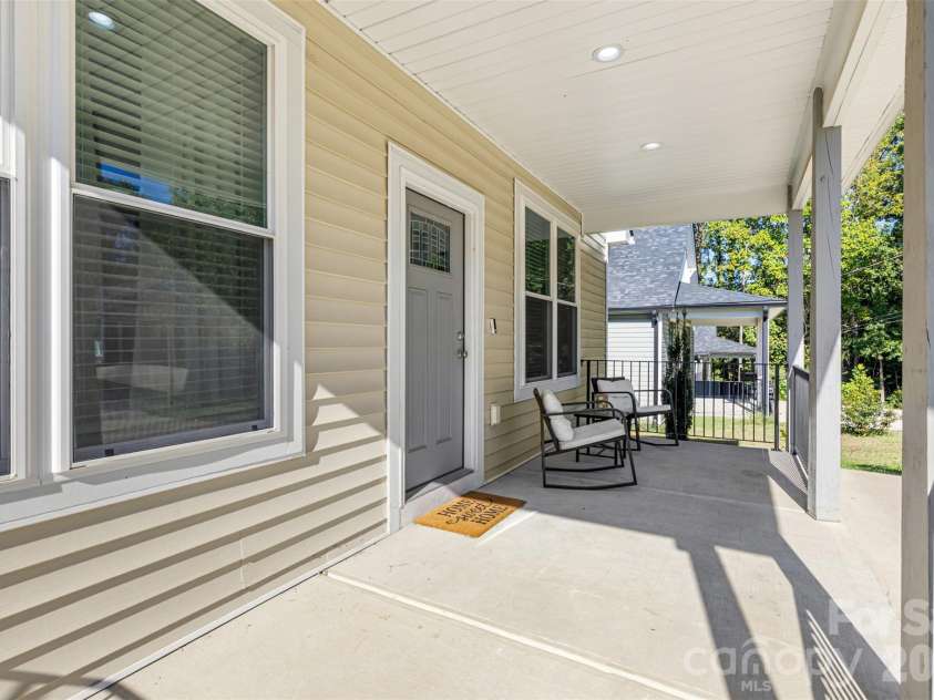 3425 Mable Hubbard Drive, Charlotte, NC 28208.  MLS# CAR4430976, YatesRealty ID 55762. Rocking chair ready