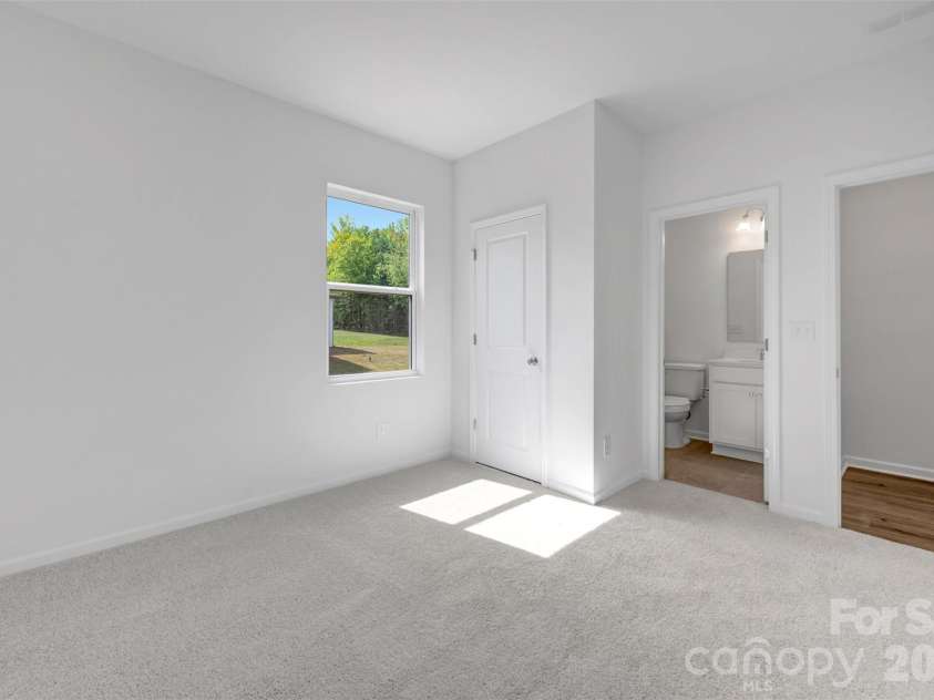 221 Amber Glen Drive, Locust, NC 28097.  MLS# CAR4351654, YatesRealty ID 5577. Guest suite