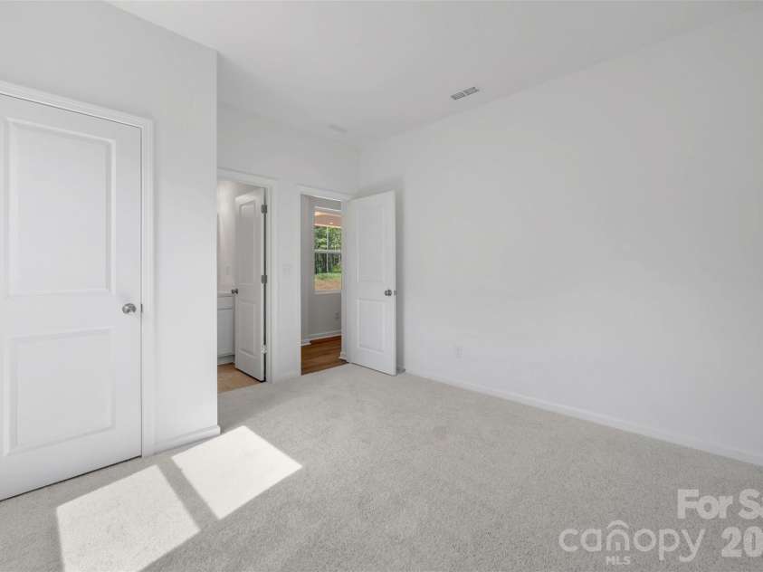 221 Amber Glen Drive, Locust, NC 28097.  MLS# CAR4351654, YatesRealty ID 5577. Guest suite
