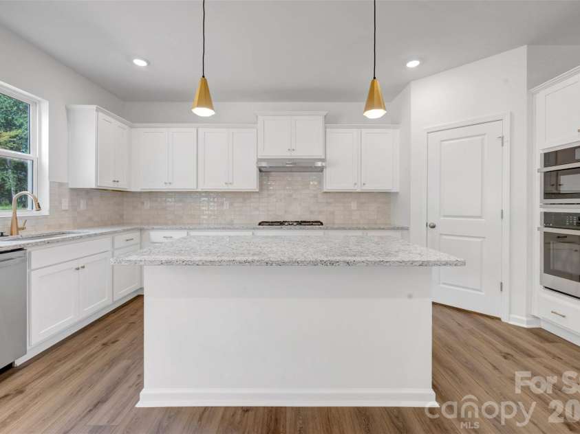 221 Amber Glen Drive, Locust, NC 28097.  MLS# CAR4351654, YatesRealty ID 5577. Kitchen