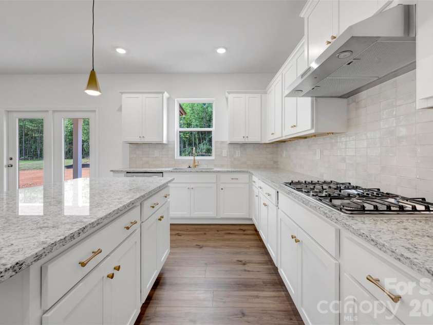 221 Amber Glen Drive, Locust, NC 28097.  MLS# CAR4351654, YatesRealty ID 5577. Kitchen