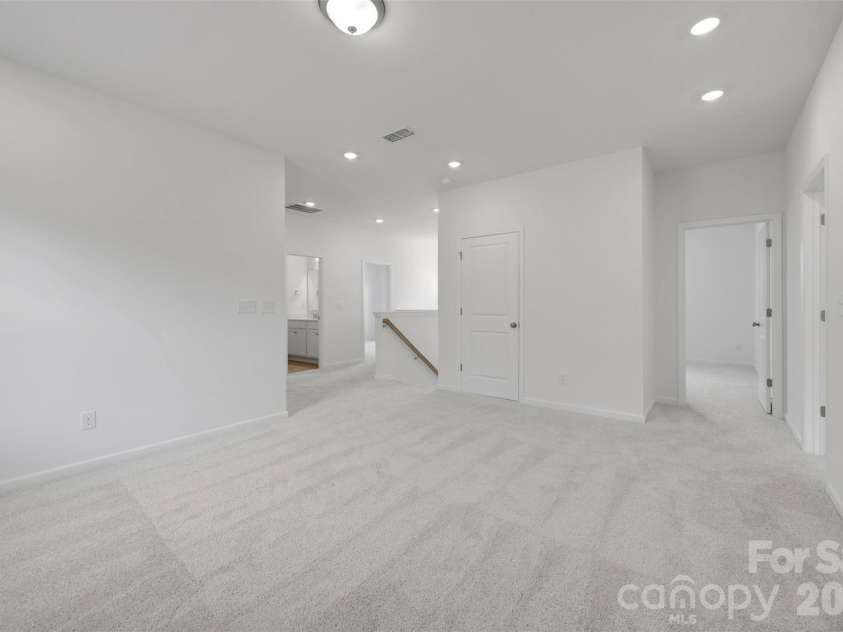 221 Amber Glen Drive, Locust, NC 28097.  MLS# CAR4351654, YatesRealty ID 5577. Loft