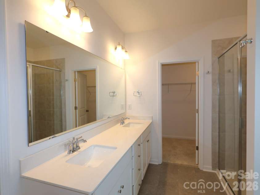 221 Amber Glen Drive, Locust, NC 28097.  MLS# CAR4351654, YatesRealty ID 5577. Owner's suite