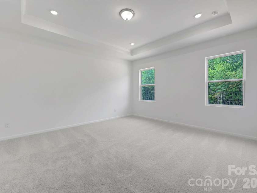 221 Amber Glen Drive, Locust, NC 28097.  MLS# CAR4351654, YatesRealty ID 5577. Owner's suite