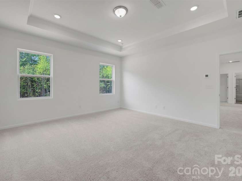 221 Amber Glen Drive, Locust, NC 28097.  MLS# CAR4351654, YatesRealty ID 5577. Owner's suite