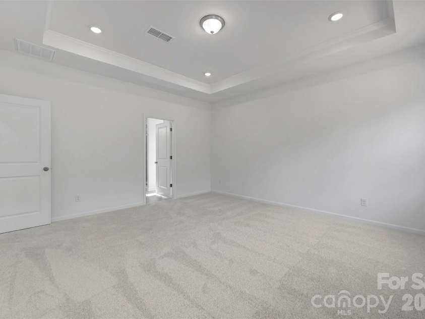 221 Amber Glen Drive, Locust, NC 28097.  MLS# CAR4351654, YatesRealty ID 5577. Owner's suite