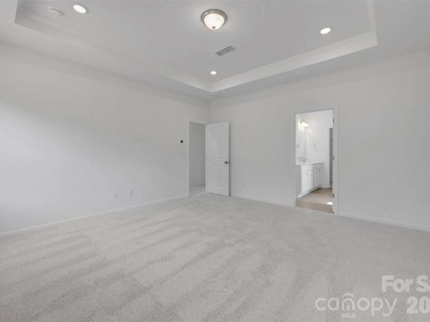 221 Amber Glen Drive, Locust, NC 28097.  MLS# CAR4351654, YatesRealty ID 5577. Owner's suite