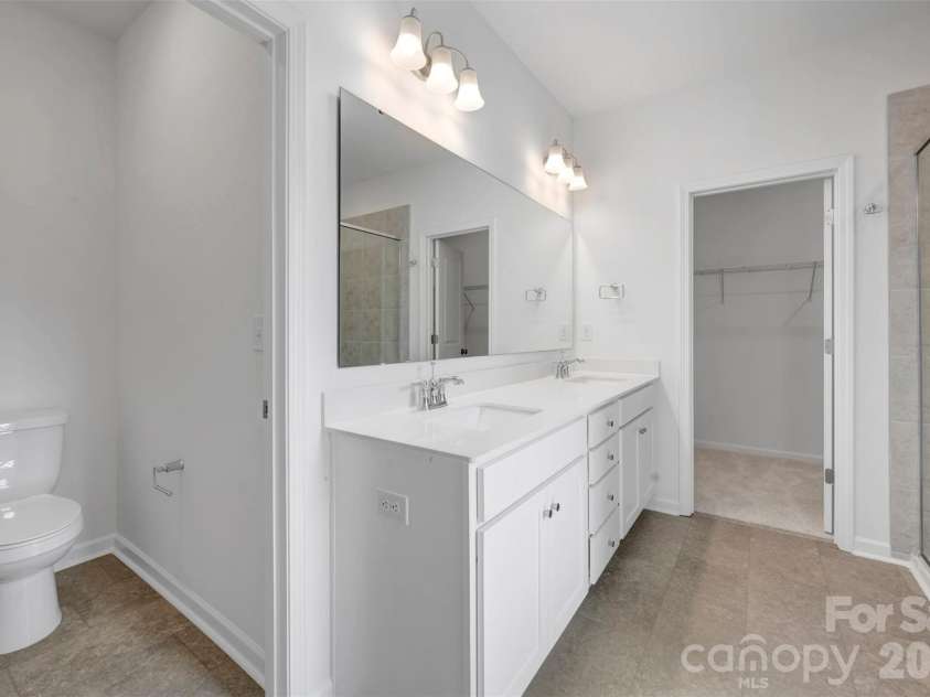 221 Amber Glen Drive, Locust, NC 28097.  MLS# CAR4351654, YatesRealty ID 5577. Owner's suite