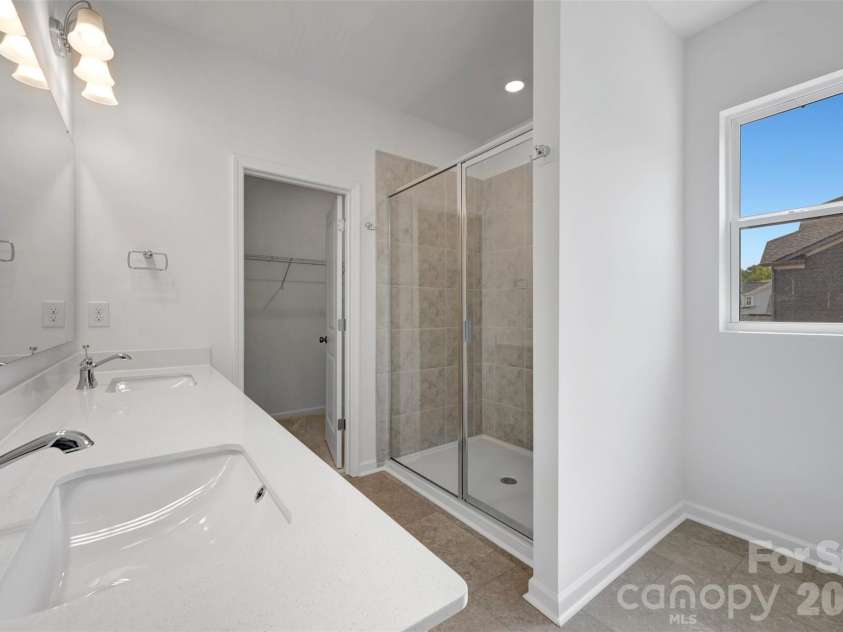 221 Amber Glen Drive, Locust, NC 28097.  MLS# CAR4351654, YatesRealty ID 5577. Owner's suite