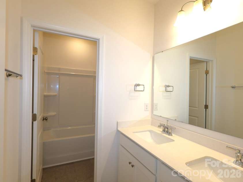 221 Amber Glen Drive, Locust, NC 28097.  MLS# CAR4351654, YatesRealty ID 5577. Secondary bathroom