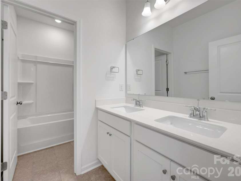 221 Amber Glen Drive, Locust, NC 28097.  MLS# CAR4351654, YatesRealty ID 5577. Secondary bathroom