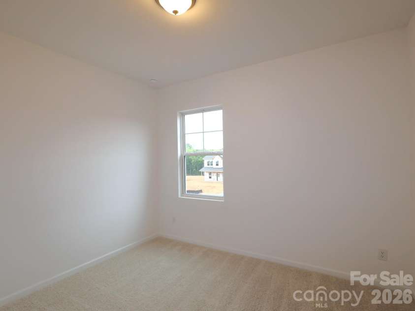221 Amber Glen Drive, Locust, NC 28097.  MLS# CAR4351654, YatesRealty ID 5577. Secondary bedroom