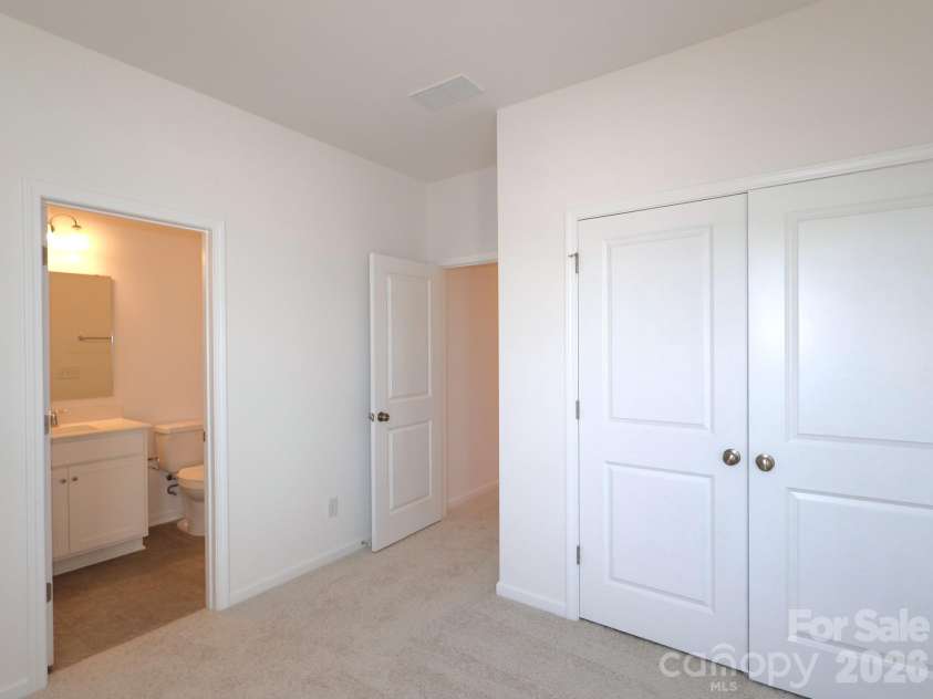 221 Amber Glen Drive, Locust, NC 28097.  MLS# CAR4351654, YatesRealty ID 5577. Secondary bedroom
