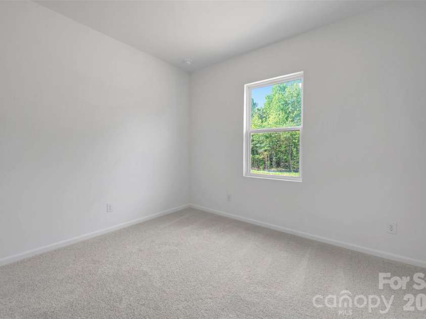 221 Amber Glen Drive, Locust, NC 28097.  MLS# CAR4351654, YatesRealty ID 5577. Secondary bedroom